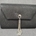 CLUTCH FIESTA PURPURINA NEGRO CADENA - Imagen 1